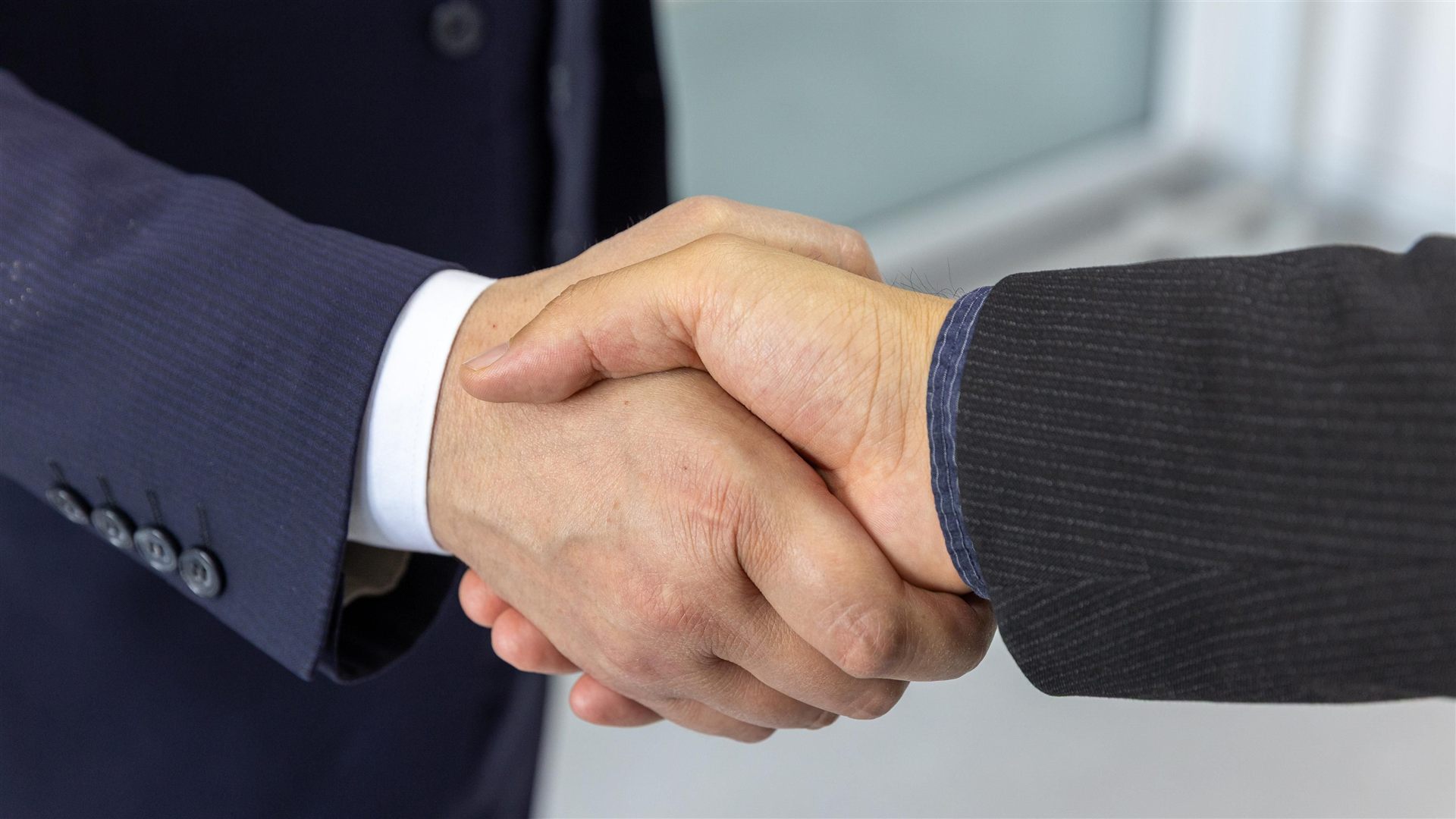 Handshake between partners marking a successful engagement